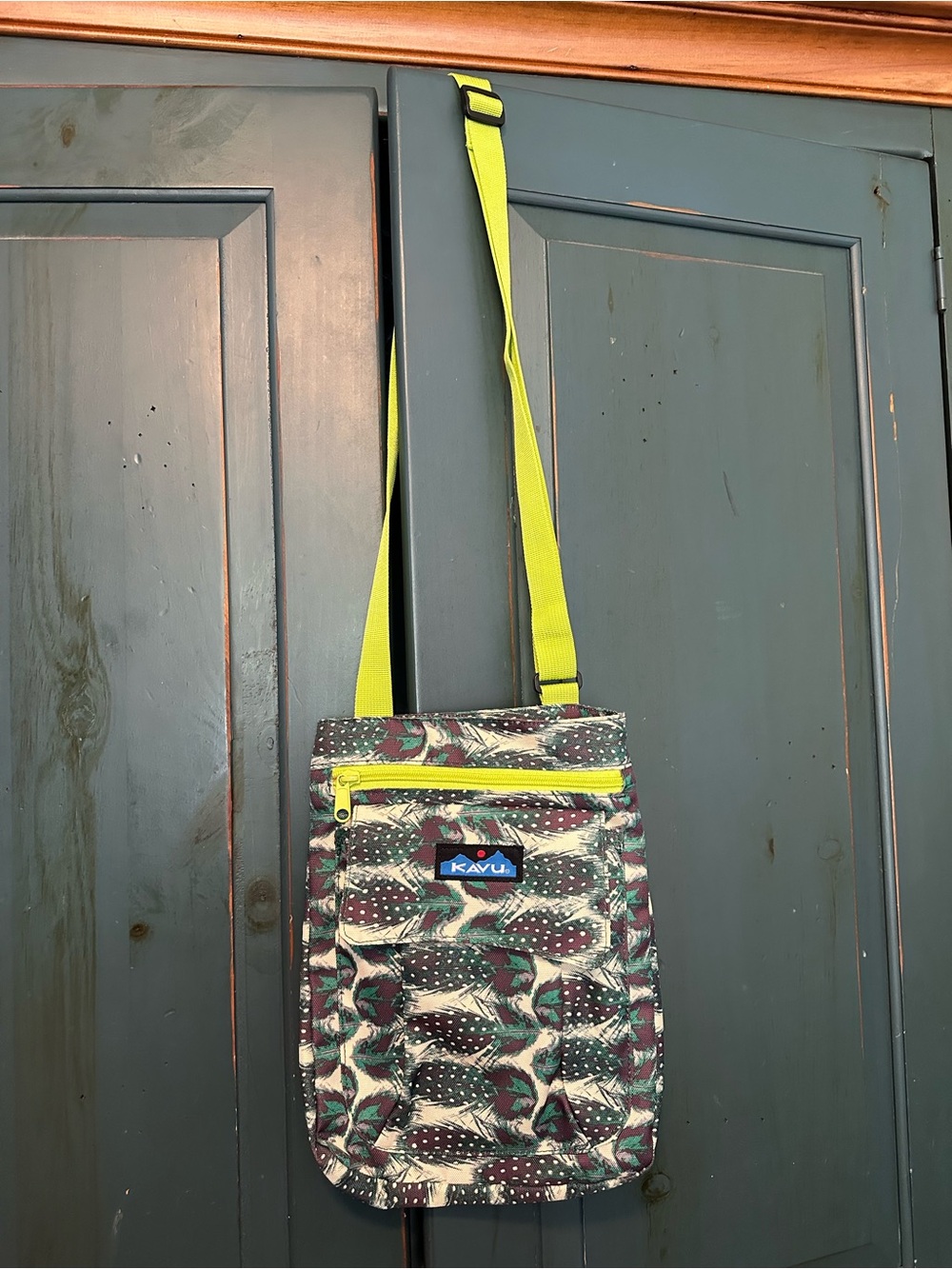 Kavu Feather Printed Crossbody Bag with Neon Yellow Strap